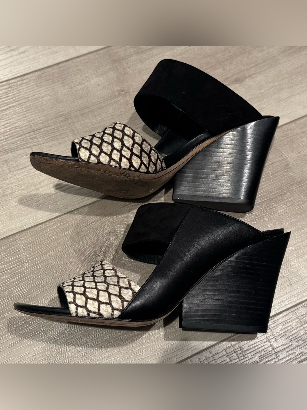 10 Crosby Derek Lam Black Slide Mules with suede and cow hide straps.